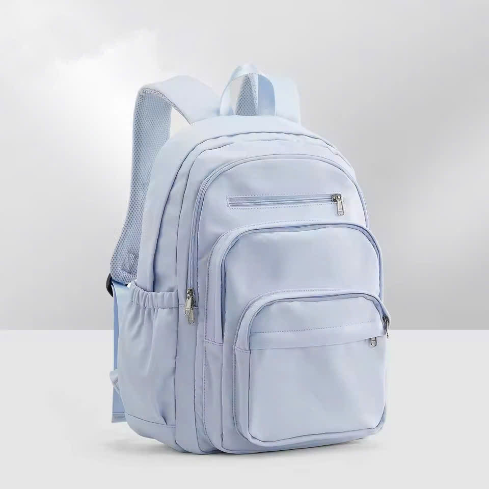 Nylon School Backpack for Teens โ Unisex Casual Travel Book Bag with Luggage Strap and Adjustable Shoulder Straps