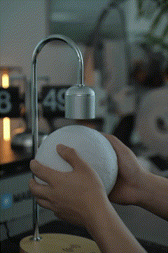 Floating Glow Moon Lamp – Wireless Phone Charging Light