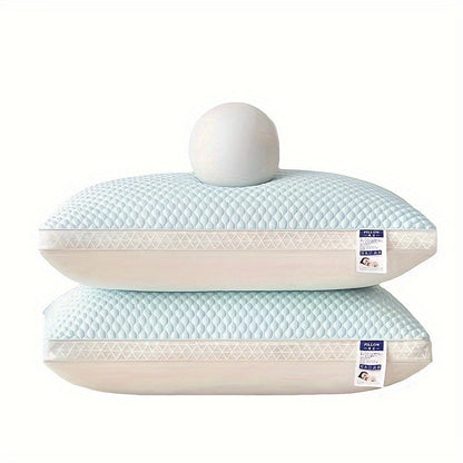Two light blue pillows with white stitching on a white background