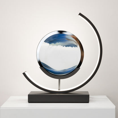 Decorative sphere with a circular base on a white surface