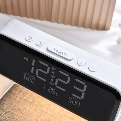 Digital clock with time display on a wooden surface