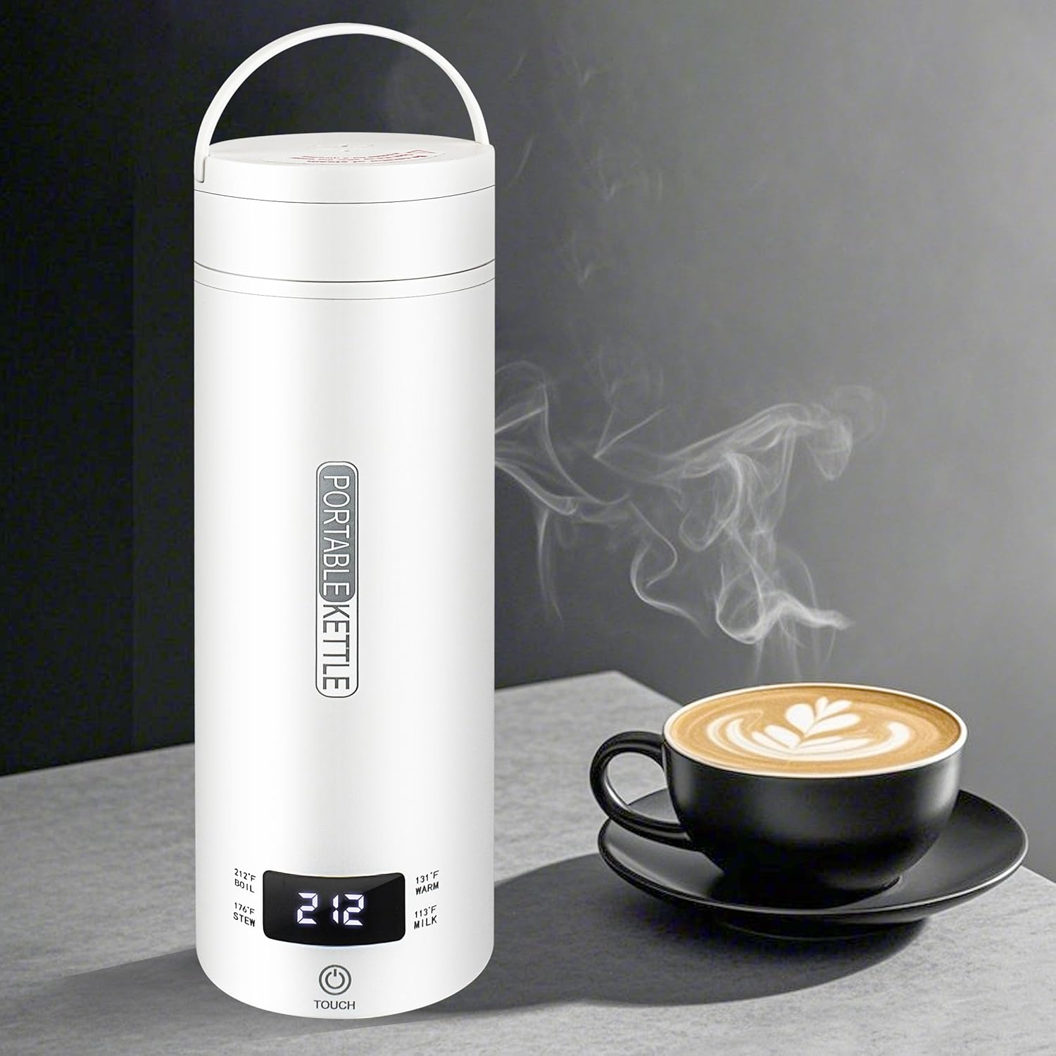 White portable kettle with digital display next to a steaming cup of coffee on a dark background