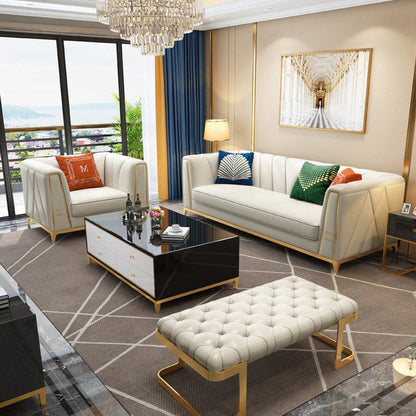 Modern living room with white sofa, coffee table, and decorative pillows.