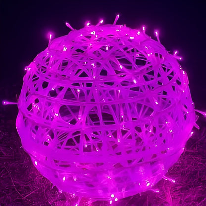 Decorative ball with purple LED lights on a dark background