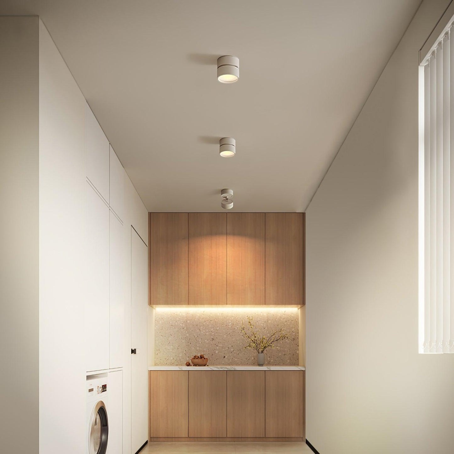 Modern kitchen with wooden cabinets and white walls