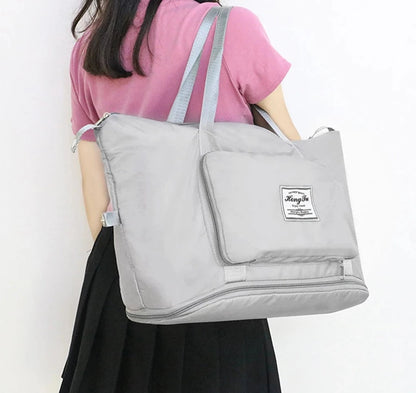 Compact Travel Duffel – Lightweight Luggage with Multiple Pockets