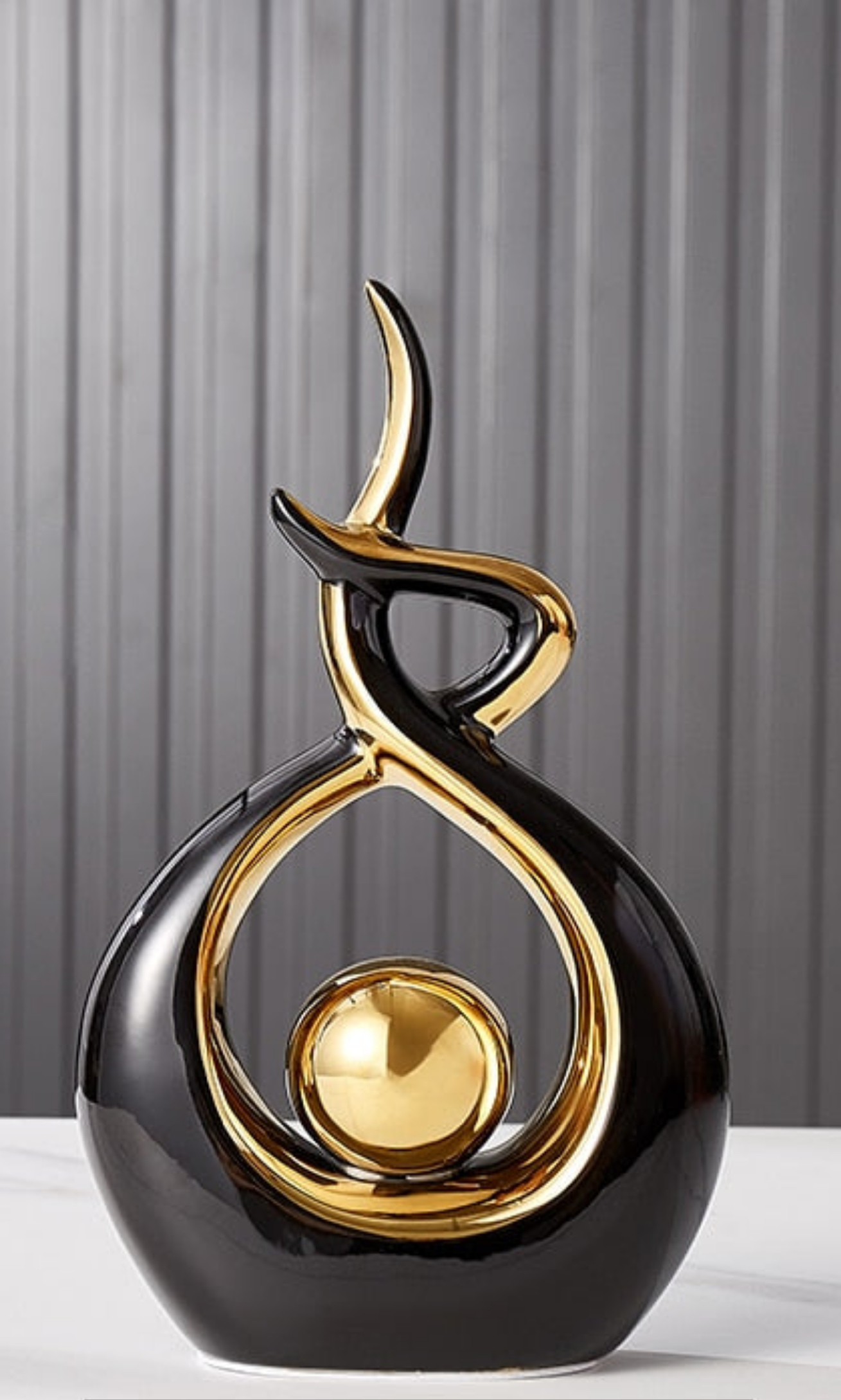Elegant Ceramic Art Statue with Gold Details