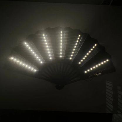 Black LED fan on a dark background