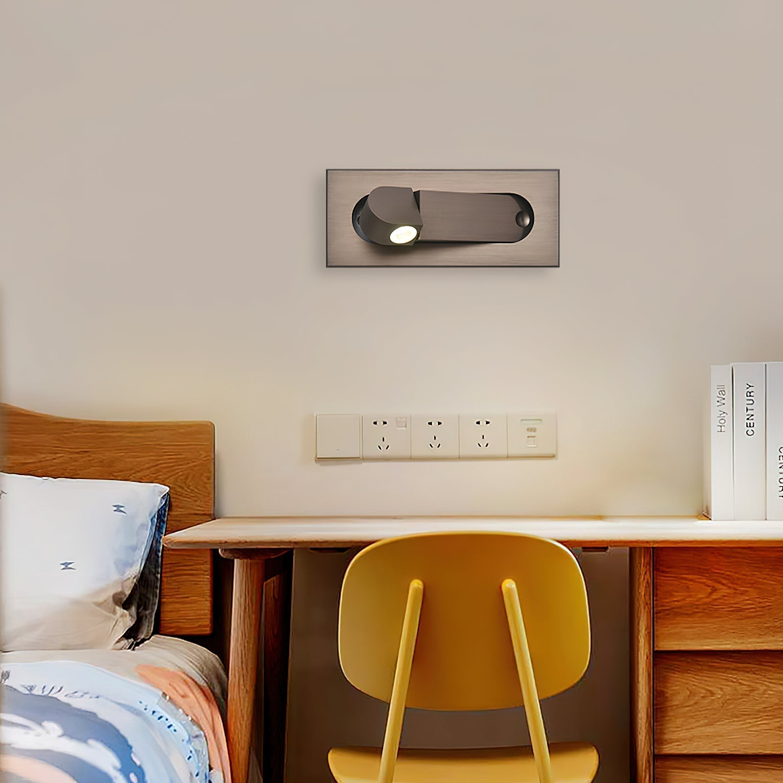 Small bedroom with a bed, desk, and yellow chair.