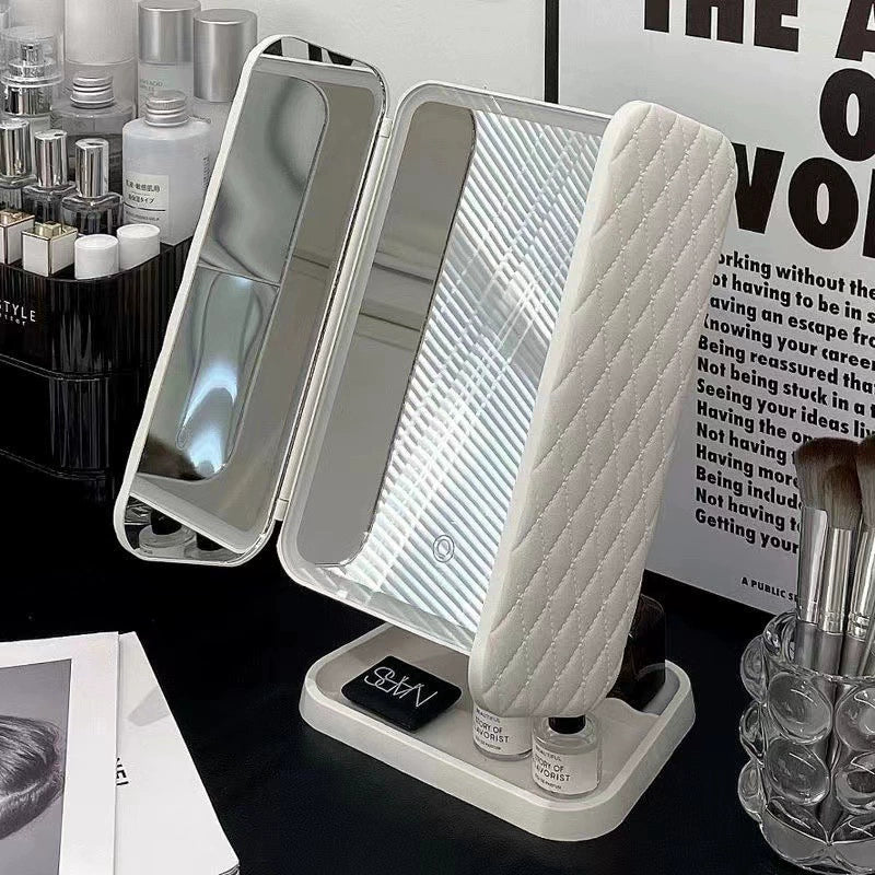 White LED lamp with mirror on a desk with beauty products