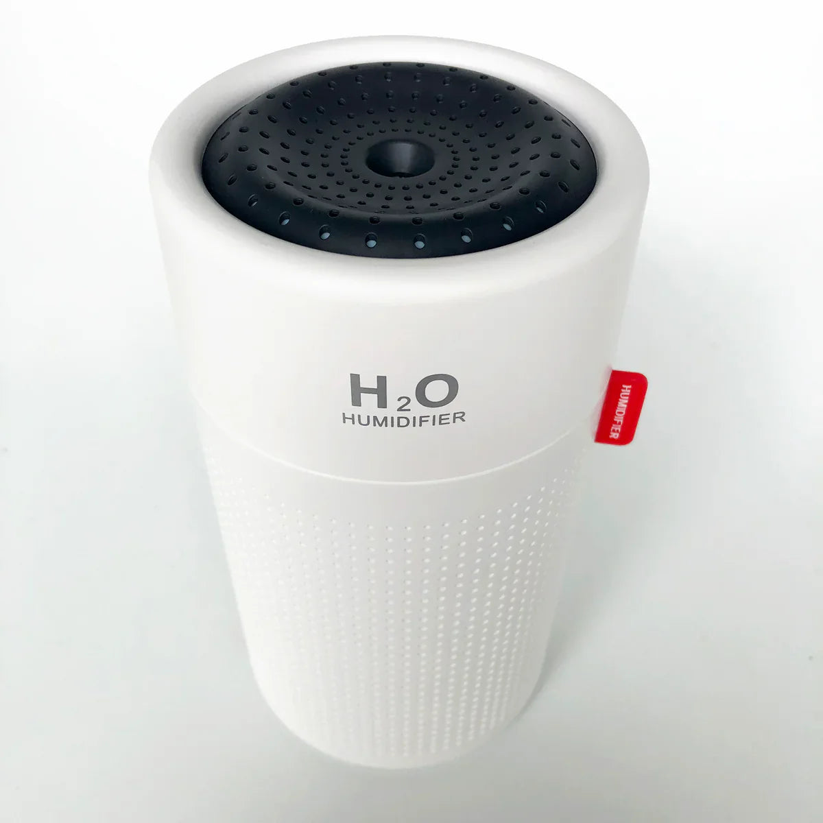 White H2O humidifier with black top on a white background