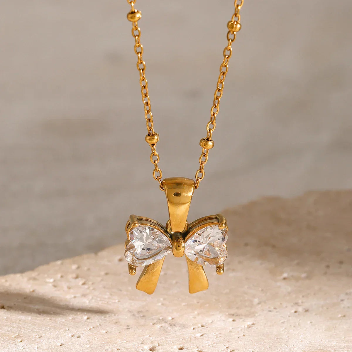 Delicate Women's Diamond Bow Pendant Necklace - Halri