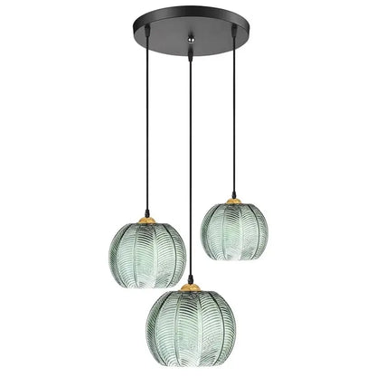 Elegant Glass Pendant Light with Green Leaf Design