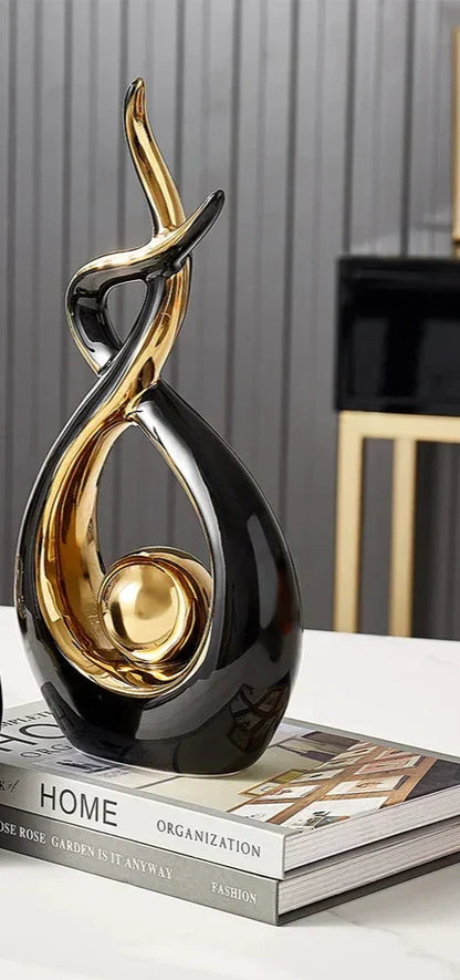 Elegant Ceramic Art Statue with Gold Details