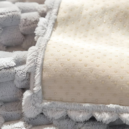 Close-up of textured pillows with a focus on color and pattern.