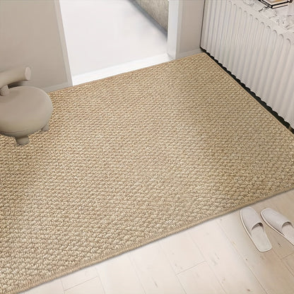 Beige textured rug on a light wooden floor with a chair and shoes in the corner.