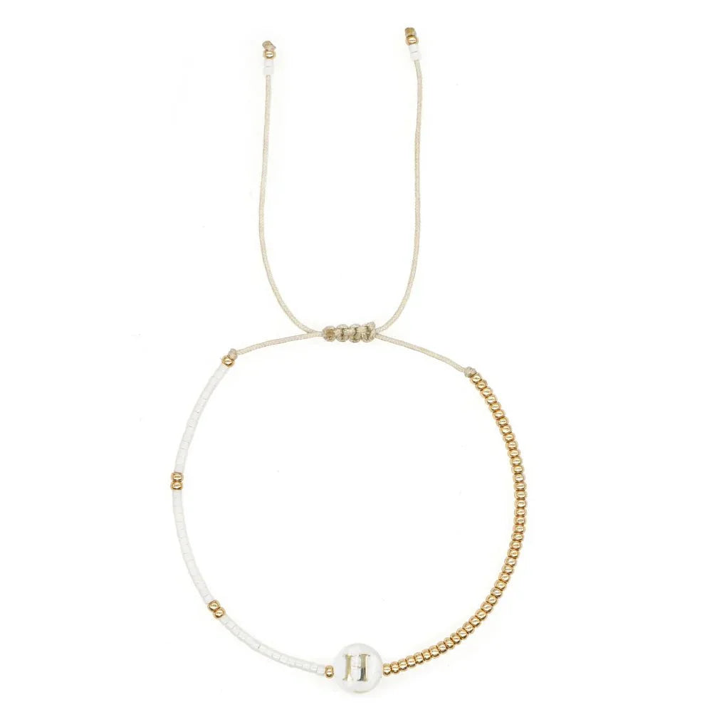 Chic White and Gold Initial Bead Charm Bracelet