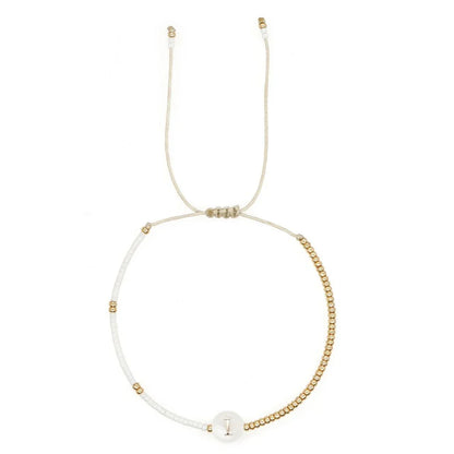 Chic White and Gold Initial Bead Charm Bracelet
