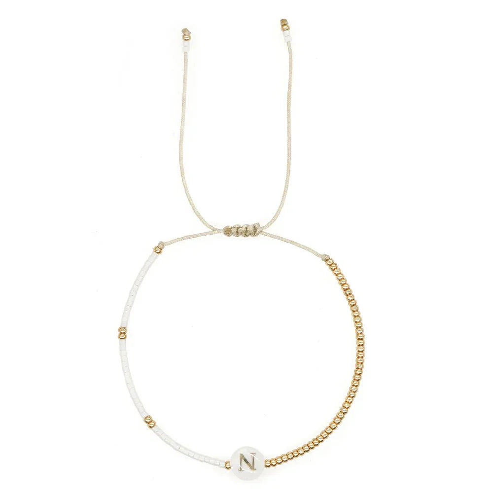 Chic White and Gold Initial Bead Charm Bracelet