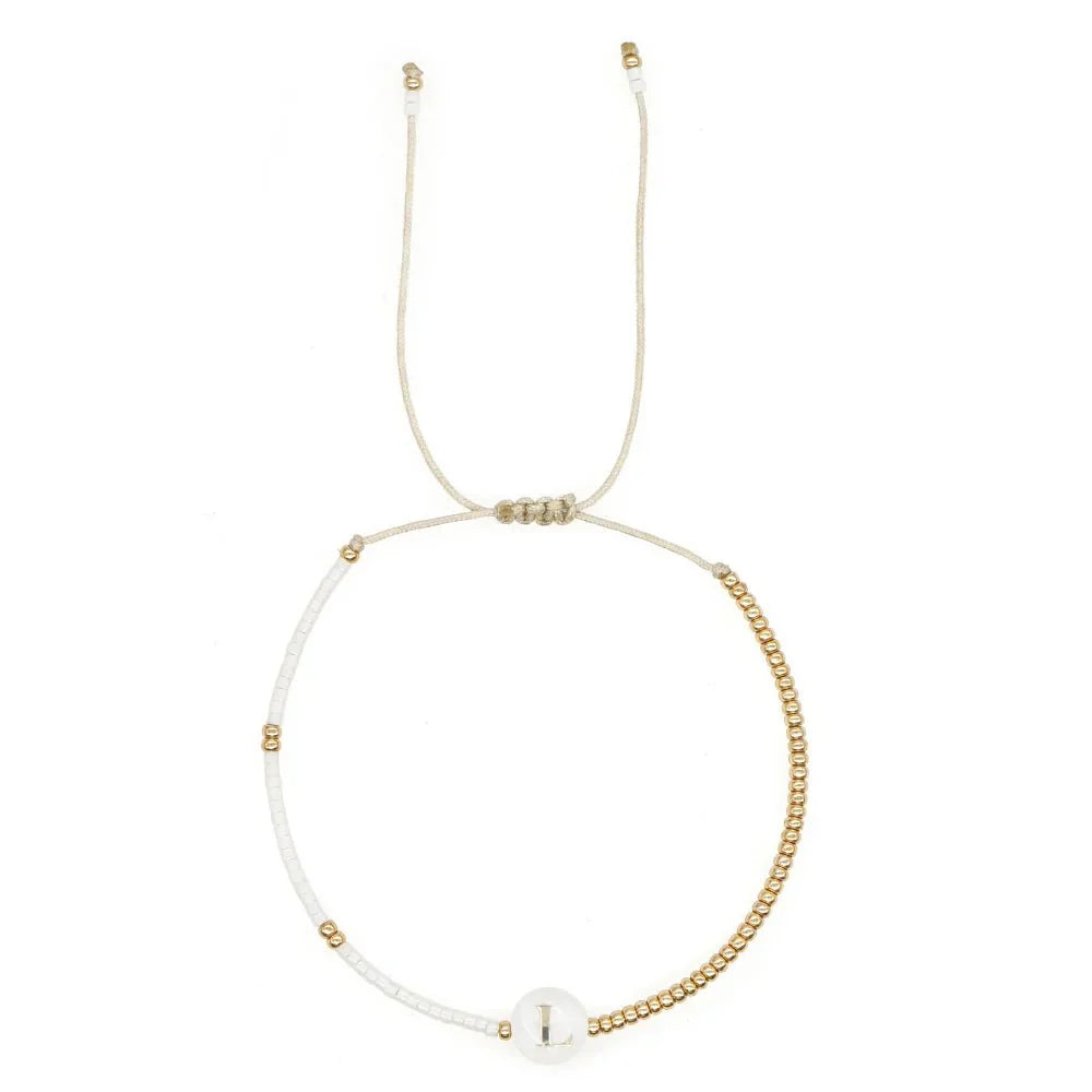 Chic White and Gold Initial Bead Charm Bracelet