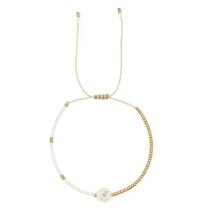 Chic White and Gold Initial Bead Charm Bracelet