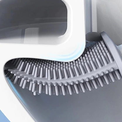 Gray scrubber with bristles on a white background