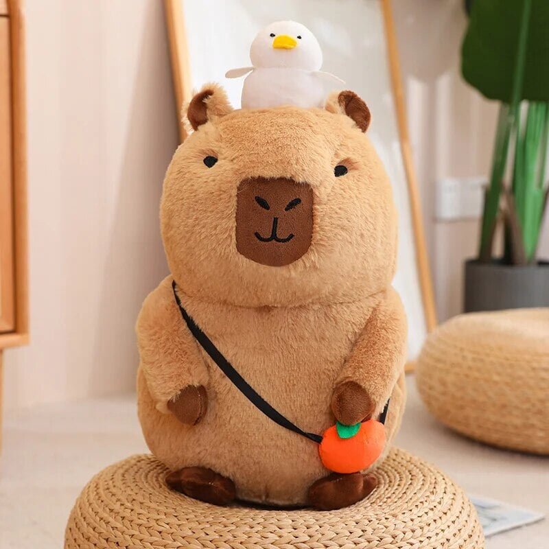 Soft Cuddly Capybara with Bright Orange Toy