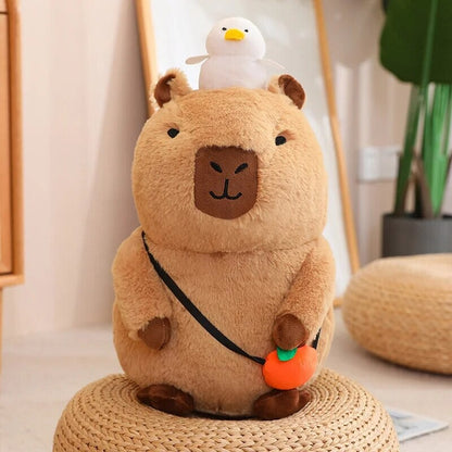 Soft Cuddly Capybara with Bright Orange Toy
